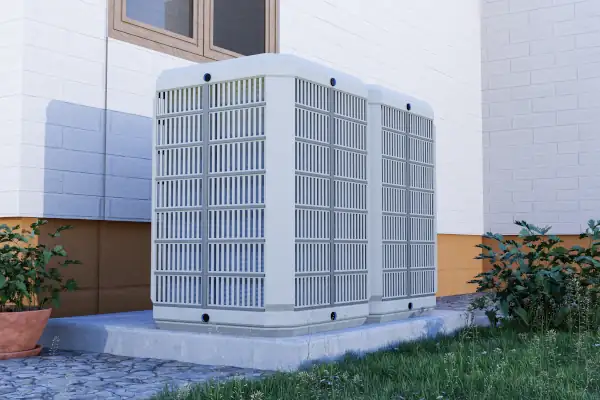 How to Extend the Lifespan of Your Heat Pump - photo of a heat pump on the outside of a house.